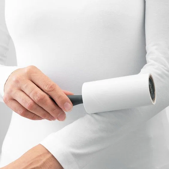 Brosse adhésive