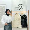 قميص دانتيل أبيض أنيق بتصميم راقٍ ولمسات فاخرة
